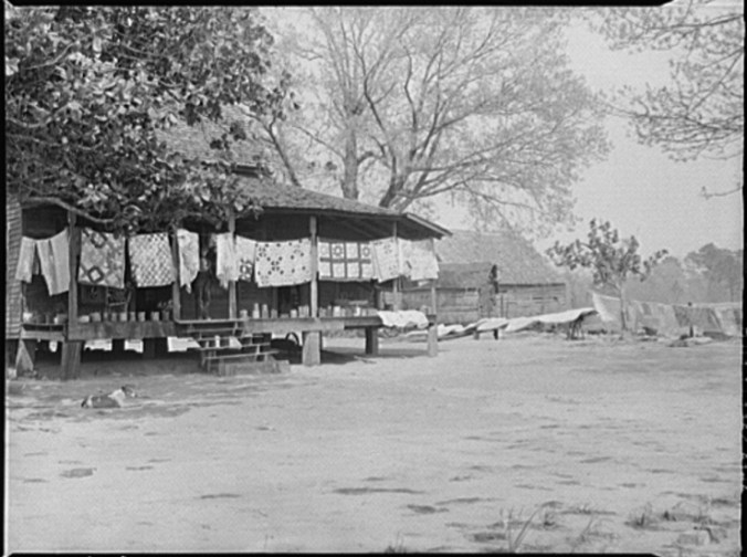 “Typical farmhouse, spring housecleaning, homemade quilts and bedding in sun. Coffee County, Alabama.” Photos taken April 1939 by Marion Post Wolcott.